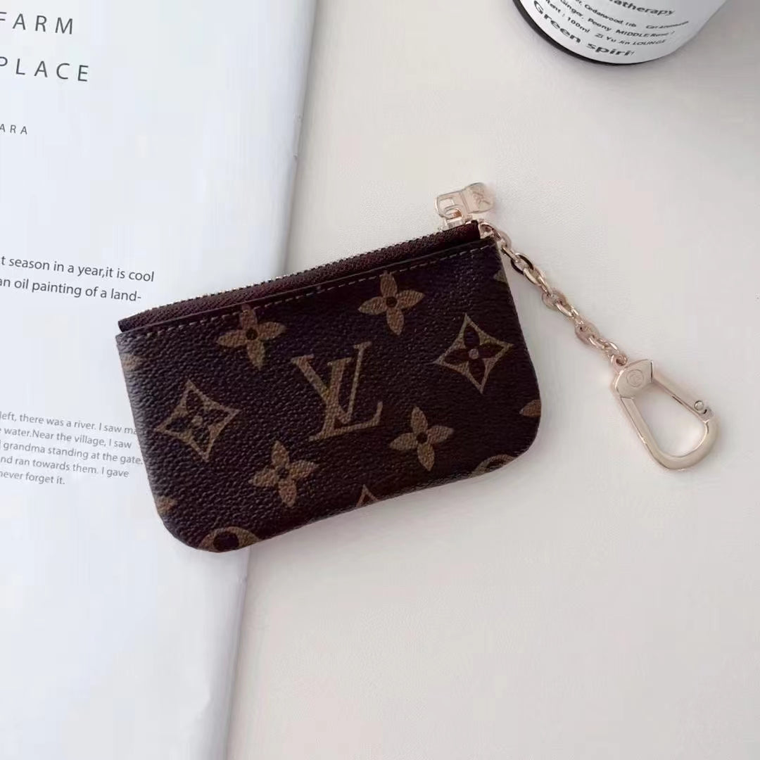 Sleek Card Wallet by Louis Vuitton