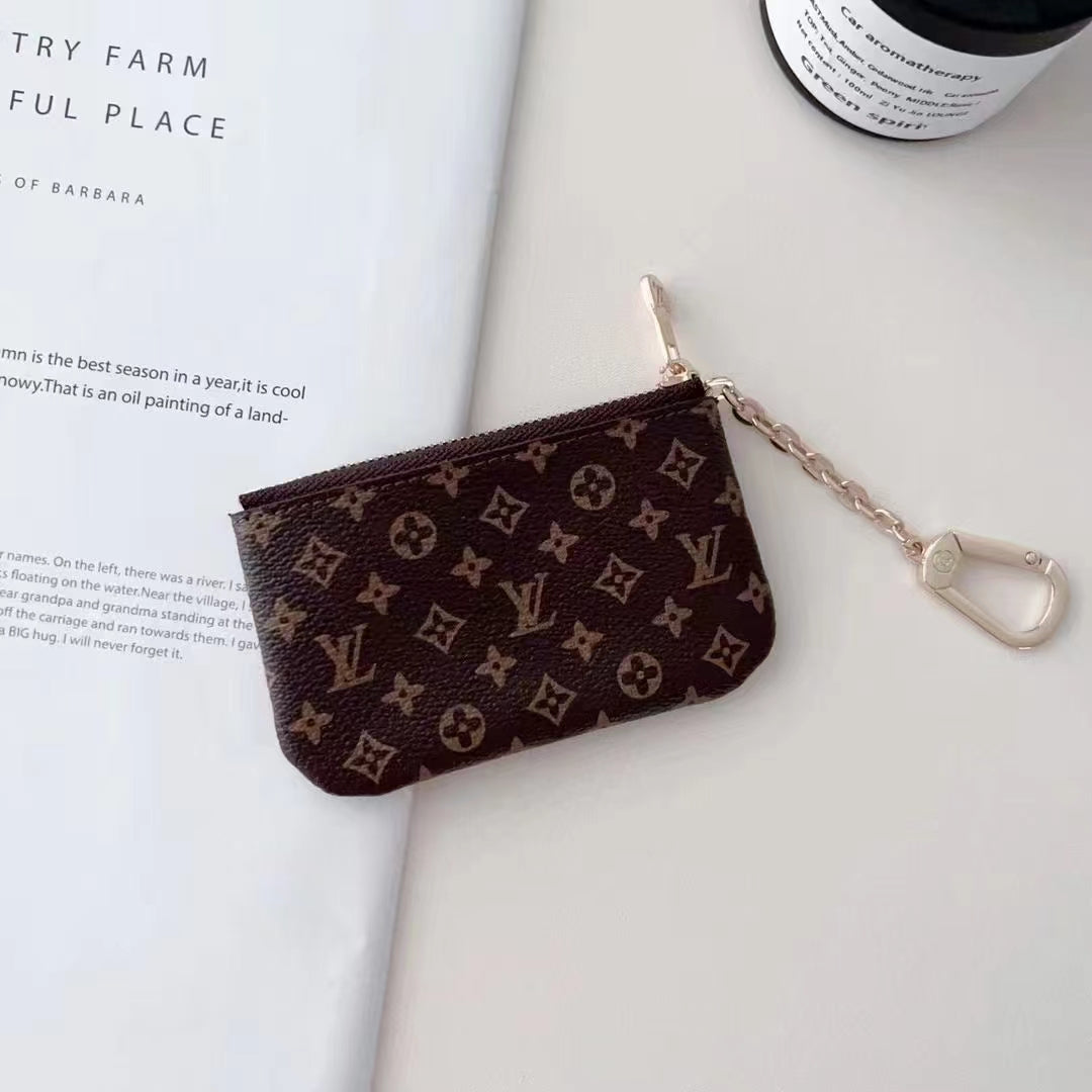 Sleek Card Wallet by Louis Vuitton