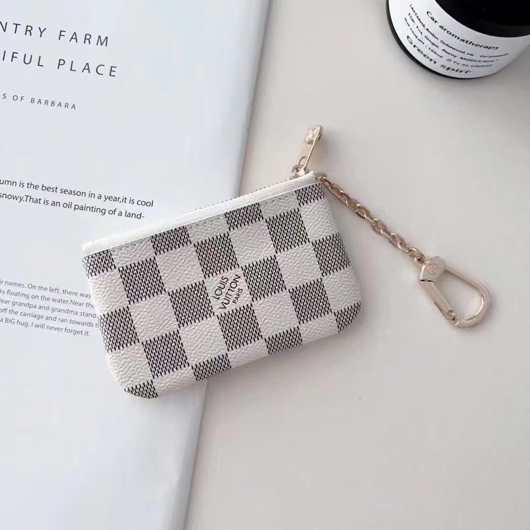 Sleek Card Wallet by Louis Vuitton