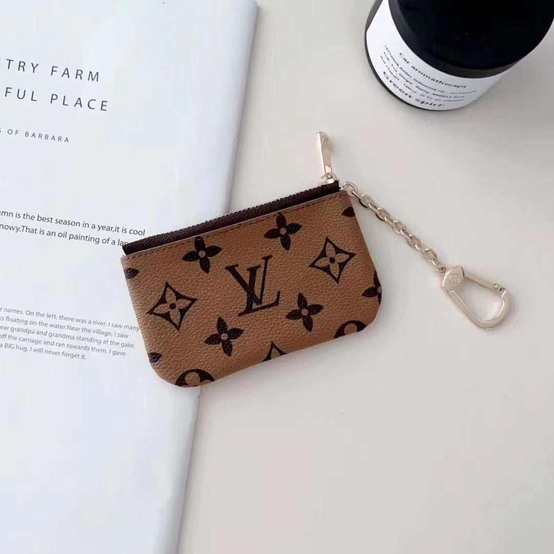 Sleek Card Wallet by Louis Vuitton