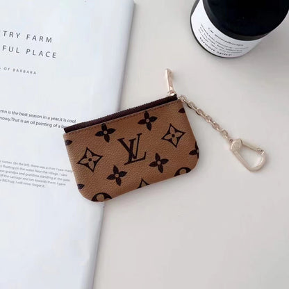 Sleek Card Wallet by Louis Vuitton